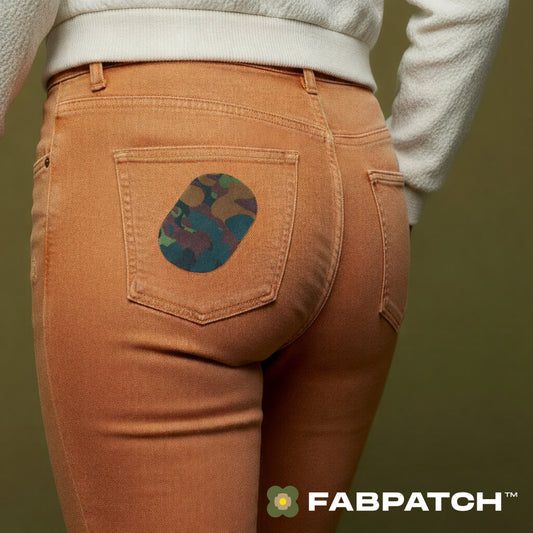 Brown pants with a camouflage patch on the back pocket, featuring the Fabpatch logo.